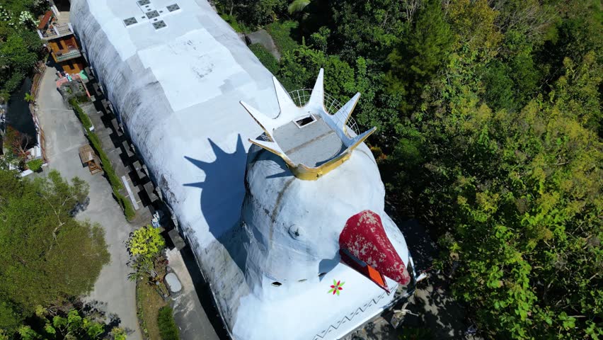 Bukit Rhema Chicken Church is a Place of Worship located in Magelang, Central Java, Indonesia. Even though it is called the "Chicken Church", the building is actually shaped like a dove.