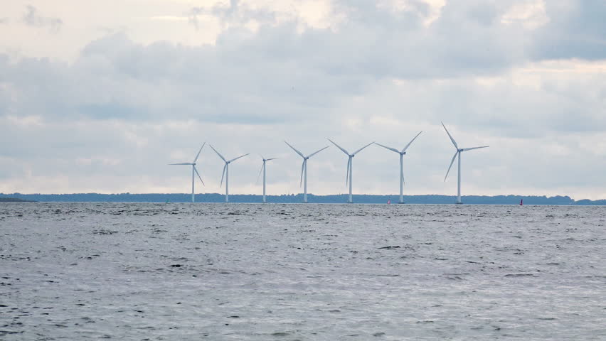 Timelapse of Modern Wind Turbines Farm in the Baltic Sea. 4K Ultra HD  | Shutterstock HD Video #33935701