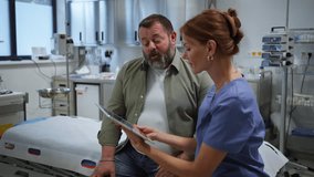 Female doctor consulting with overweight patient, discussing test result in doctor office. Obesity affecting middle-aged men's health. Concept of health risks of overwight and obesity. - Powered by Shutterstock - Get 15% off with code: PIKWIZARD15