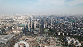 High angle view of Suzhou city cityscape in sunny day, drone view 4k real time footage, rising up effect.