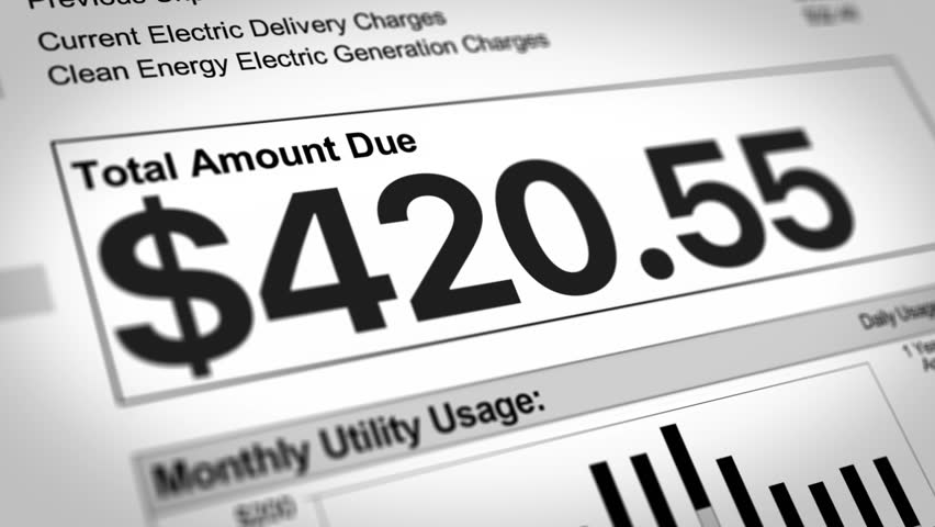 A close-up view of a household bills rising. Increased cost of living concept.  	 Living paycheck to paycheck concept.
