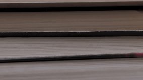 Book shelf's in library. Close up Many books organized in shelves in a big bookstore. The concept of learning, reading, and knowledge. Vertical video - Powered by Shutterstock - Get 15% off with code: PIKWIZARD15