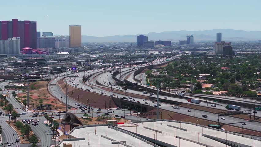Aerial view on the Las Vegas city in Nevada, USA. Huge highways, traffic, and luxury hotels in Vegas along the Strip.
