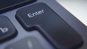 A finger on the black keyboard clicks on the keys  "Enter", "Back", "Delete", "Arrow". Macro. Closeup. Slow mo, slo mo, slow motion, high speed camera, 240fps, 250fps - Powered by Shutterstock - Get 15% off with code: PIKWIZARD15