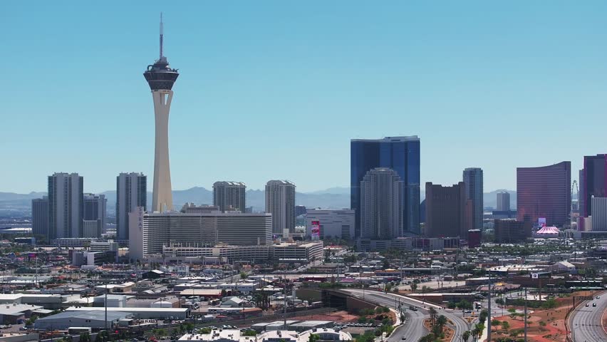 Aerial view on the Las Vegas city in Nevada, USA. Huge highways, traffic, and luxury hotels in Vegas along the Strip.