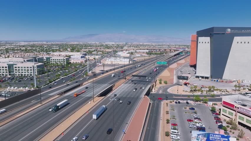 Aerial view on the Las Vegas city in Nevada, USA. Huge highways, traffic, and luxury hotels in Vegas along the Strip.