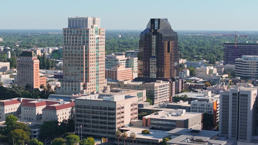 Aerial view of the Sacramento city from above. View of the downtown with the Tower Bridge on the horizon.