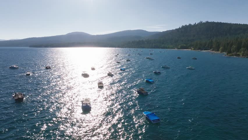 Beautiful aerial view of the Tahoe lake from above in California, USA. Wild forests, fresh air and mountains of California.