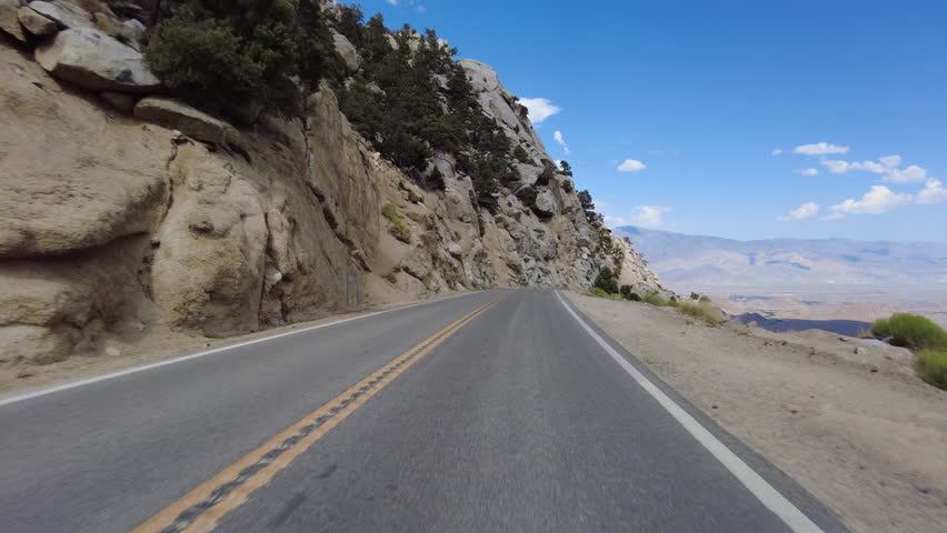 Mt Whitney Portal Road Driving Plate Descend 06 MultiCam Front View Driving Plate Sierra Nevada Mts California USA Royalty-Free Stock Footage #3394382441