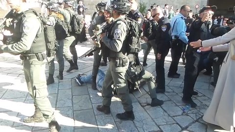 Palestinian protest against President Trump's decision to move the US Embassy from Tel Aviv to Jerusalem. The police use force against them. Damascus gate, Jerusalem, Israel, December 8, 2017