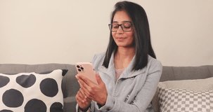 Woman using smart phone. Smiling woman.