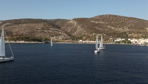 SARONIC GULF, GREECE - SEPTEMBER 23: Boats competitors during of sailing regatta "Viva Greece 2012" on September 23, 2012 on Saronic Gulf, Greece.