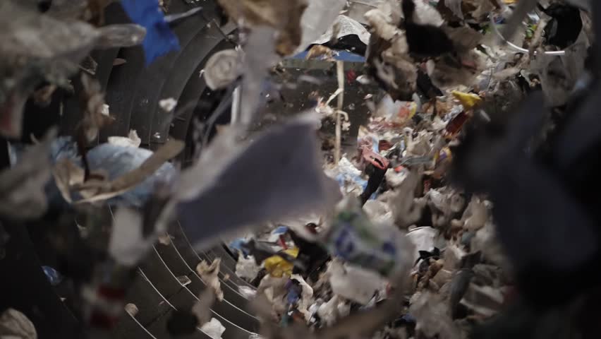 Garbage Recycling Factory line, Plastic cubes for recycle Plant, Bales of pressed boxes, rubbish warehouse collection. Preparation of recyclables for recycling, Plastic city garbage.