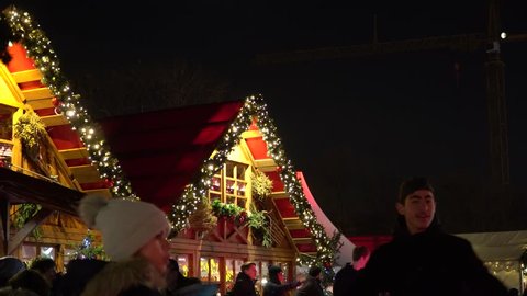 BERLIN, GERMANY - circa December 2017: People at the Christmas market (Weihnachtsmarkt) in Berlin.
