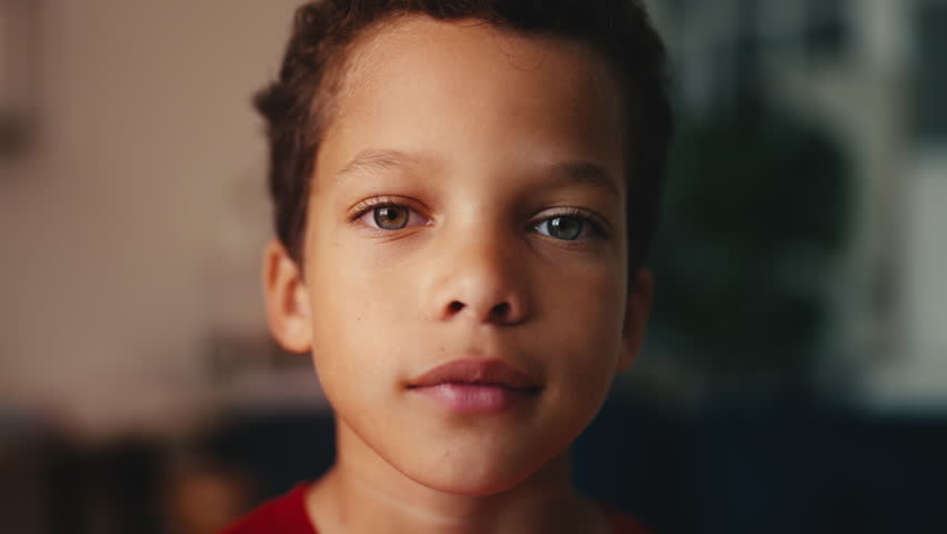 Little African American boy smiling on camera, happy childhood, beautiful people