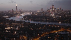 Establishing Aerial View Shot of London UK, United Kingdom, day, Square Mile, Heart of the City of London, Shard, Tower Bridge, Thames River, epic silver light, track in