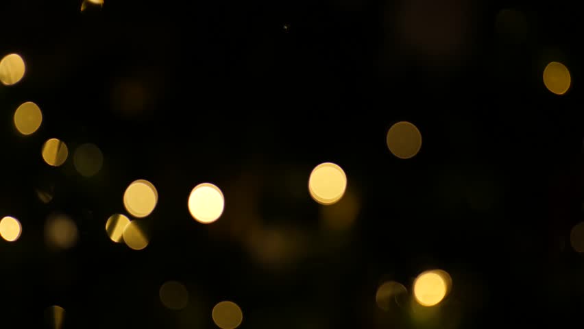 Dark festive lights christmas tree bauble fairy lights blurred bokeh abstract background - Powered by Shutterstock - Get 15% off with code: PIKWIZARD15