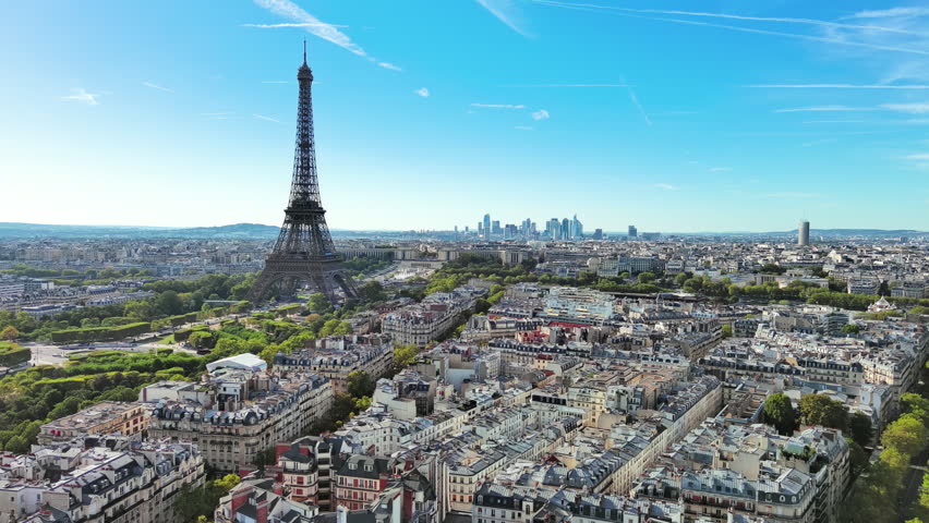Aerial View of Paris, France: Iconic Landmark Eiffel Tower and Champ de Mars, skyscrape skyline of La Défense in Background, Clear Blue Sky Royalty-Free Stock Footage #3395166839
