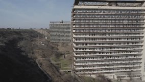 Abandoned non-residential building with the sea view. Drone view.
