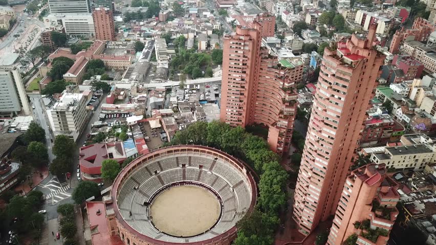 Aerial drone shot of Bogota downtown with Santamaria Bullring or Plaza de Toros de Santamaria, Colombia, Latin America. High quality 4k footage.