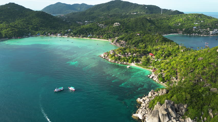 Aerial view of scenic dreamy seascape in south east Asia, koh tao Thailand pristine ocean water unpolluted natural green forest with cliff and seascape Royalty-Free Stock Footage #3395424045