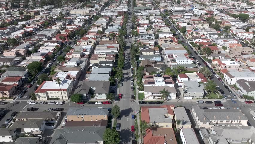 Flying Above Long Beach City, Los Angeles CA USA, Street Traffic and Buildings on Hot Sunny Day