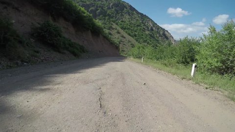 Descent on the mountain serpentine of Armenia by car