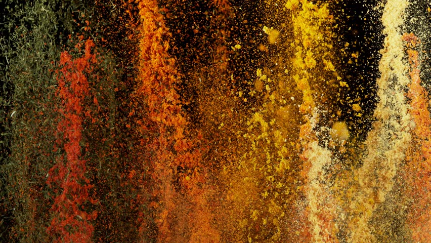 Super Slow Motion Shot of Colorful Explosion of Various Spices on Black Background at 1000fps.