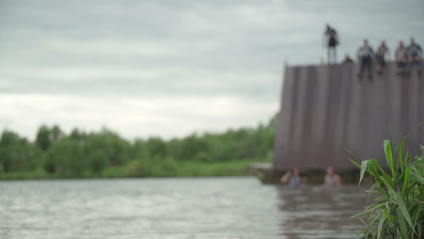 Concept team building group of young people guys and girls timelapse, men and women, mutual assistance, heavy team sports competition for survival and endurance, from last forces, loss of strength