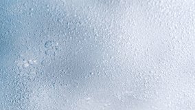 Super Slow Motion Shot of Bubbling Light Blue Background at 1000fps. - Powered by Shutterstock - Get 15% off with code: PIKWIZARD15