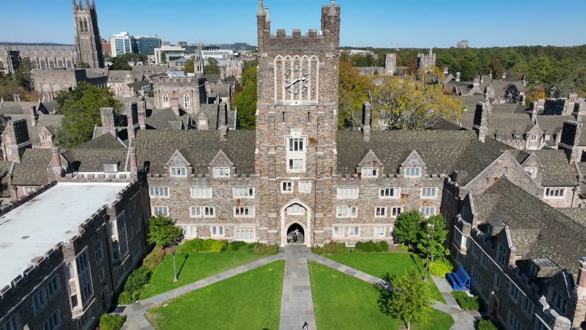 Crowell Quad at Duke University. Aerial rising shot revealing chapel and campus during autumn.