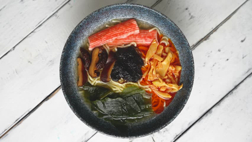 spicy kani mushroom, bamboo shoots and black moss noodles