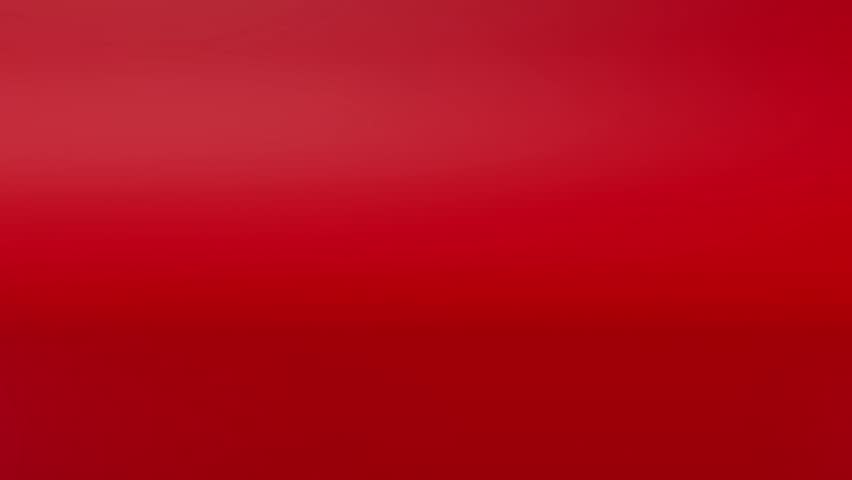 A tree of Christmas balls is growing luxury on a bright reds background. 3d animation intro Christmas