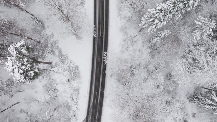 Aerial view of a snowy road in northern germany Royalty-Free Stock Footage #3396156677