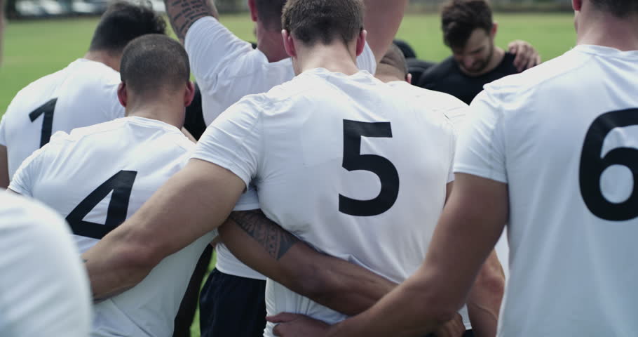 Team, rugby men and scrum on field, contest and power for territory, sports or grass with support. Group back, push and huddle for ball, game or competition at stadium, park or outdoor for tournament Royalty-Free Stock Footage #3396274589