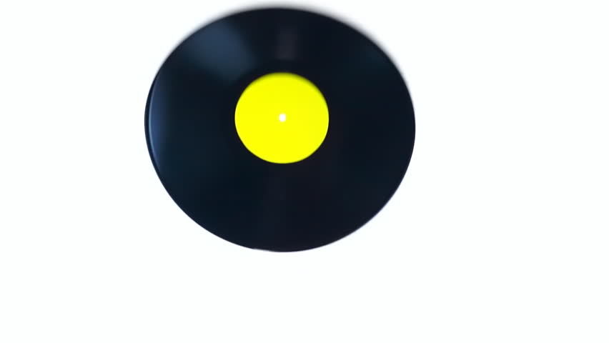 Vinyl record flies and rotates on a white background. Close Up. Slow mo, slo mo, slow motion, high speed camera, 240fps, 250fps