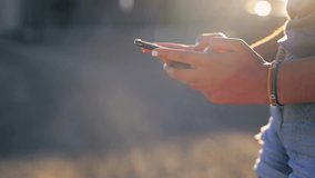 Phone, search and hands of woman outdoor with social media, chat or texting closeup. Smartphone, tech or female person in nature for travel, adventure or app for location, map or taxi service request - Powered by Shutterstock - Get 15% off with code: PIKWIZARD15