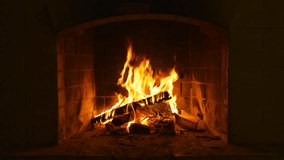 Wood Burning in a Cozy Fireplace. Fireplace Screen Sarver. Slow Motion Video of Burning Wooden Logs. A Looping Clip of Fire Flames for Meditation. Christmas time