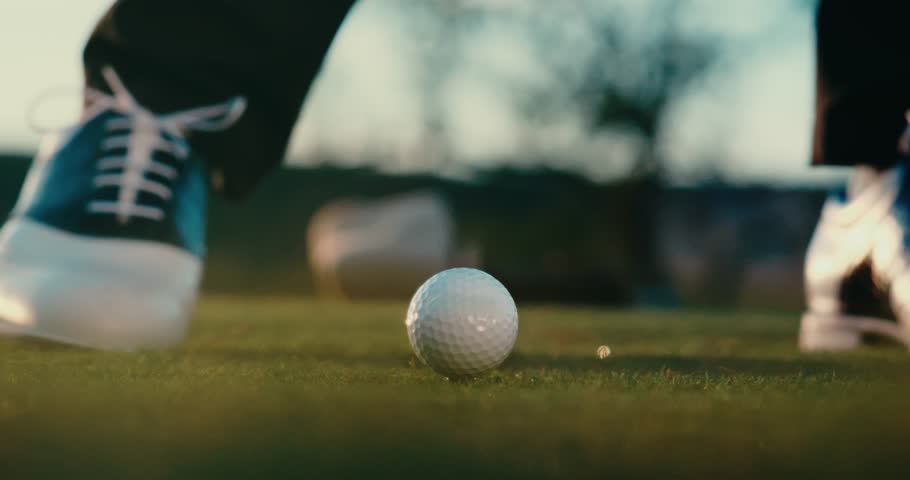 Golfer hitting ball and making big divot, golf shot with dirt flying macro close up 4k in extreme slow motion Royalty-Free Stock Footage #3396833355