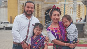 Portrait of a beautiful indigenous family, wearing elegant and beautiful clothes, looking at the camera for a family portrait. - Powered by Shutterstock - Get 15% off with code: PIKWIZARD15
