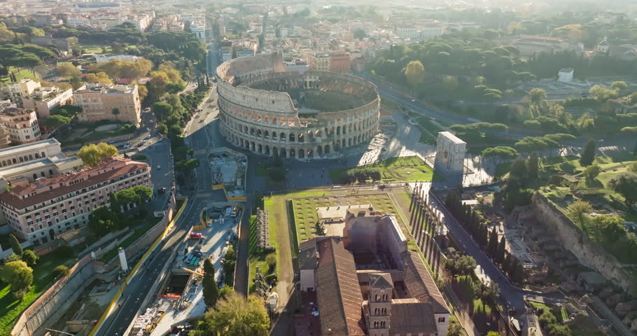 Aerial view of the Temple Palatin and the Coliseum, Rome, Italy. A tourist and historical monument, with an amphitheater and ancient ruins in the cityscape. High quality 4k footage Royalty-Free Stock Footage #3397137189