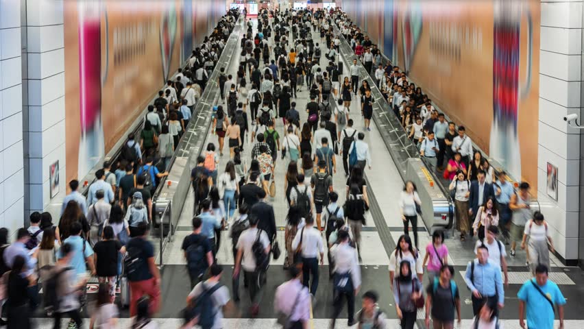 Time lapse crowd of Pedestrians walking in subway transportation hub in rush hour, Hong Kong Royalty-Free Stock Footage #3397150477
