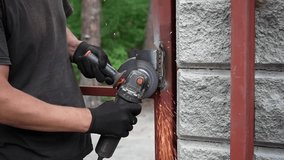Worker use an Angle Grinder producing. Worker grinding metal. Remove rust. Bright sparks and flashes - Powered by Shutterstock - Get 15% off with code: PIKWIZARD15
