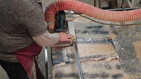 A woodworker's hands operate a saw, focus on detail. Highlights the importance of safety in manual work environments. - Powered by Shutterstock - Get 15% off with code: PIKWIZARD15