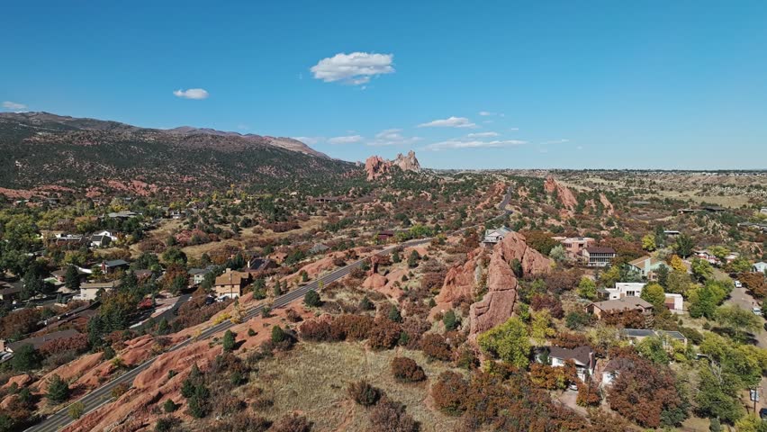 Aerial establishing overview of Garden of the Gods Colorado in the fall