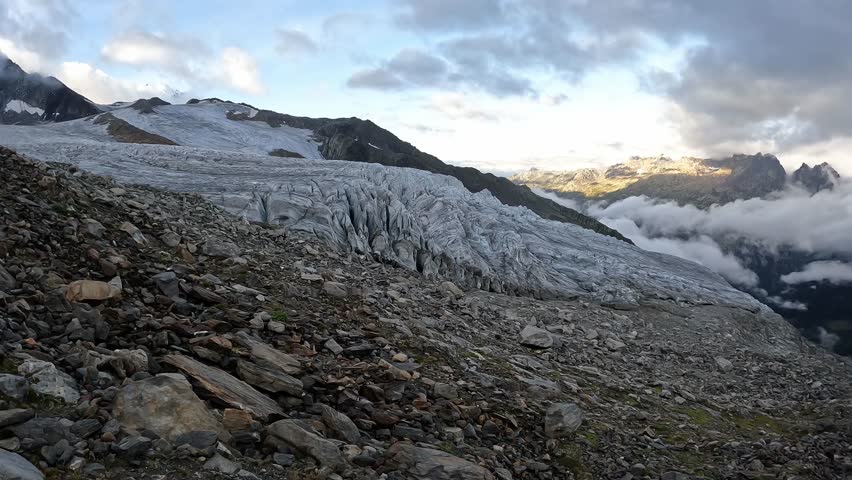 Glacier du Tour - glacier of France, rocky landscape. Mountains. French Alps, Europe, beautiful landscape. Tourism. The landscape is above the clouds