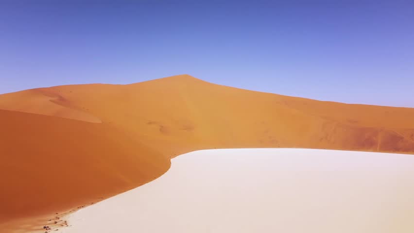 4k Drone Flying Over Deadvlei, near Sossusvlei White Salt Pan, Namib-Naukluft Park, Namibia. Explore the World's Tallest Sand Dunes – Big Daddy and Crazy Dune. Surreal Desert Landscape and Atmosphere Royalty-Free Stock Footage #3397476459