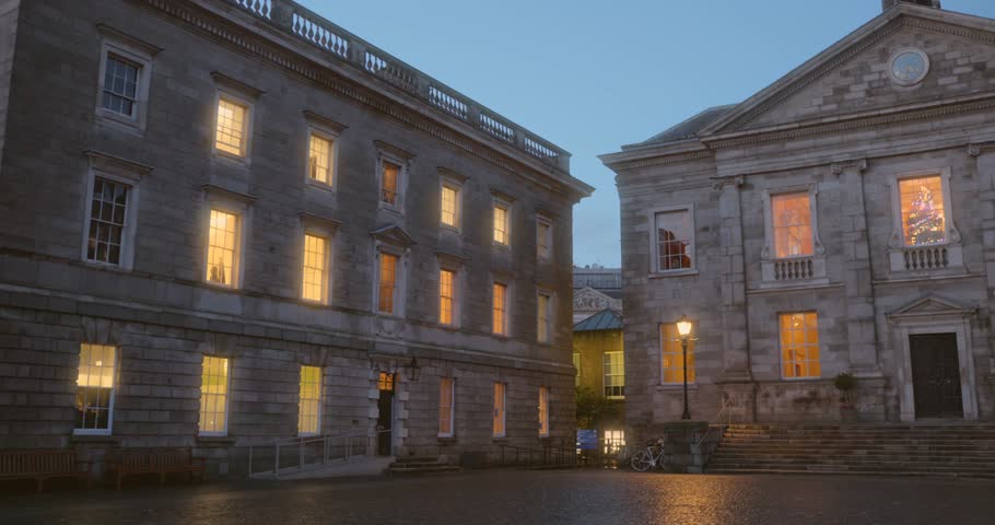 Panning shot of Trinity College and University at Christmas in Dublin, Ireland.