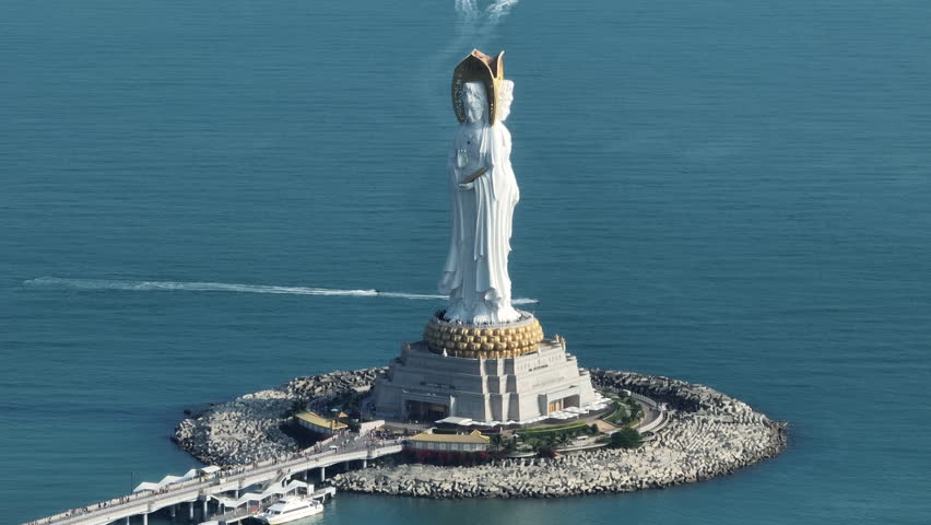 Aerial footage of Guanyin statue at seaside in nanshan temple, hainan island , China