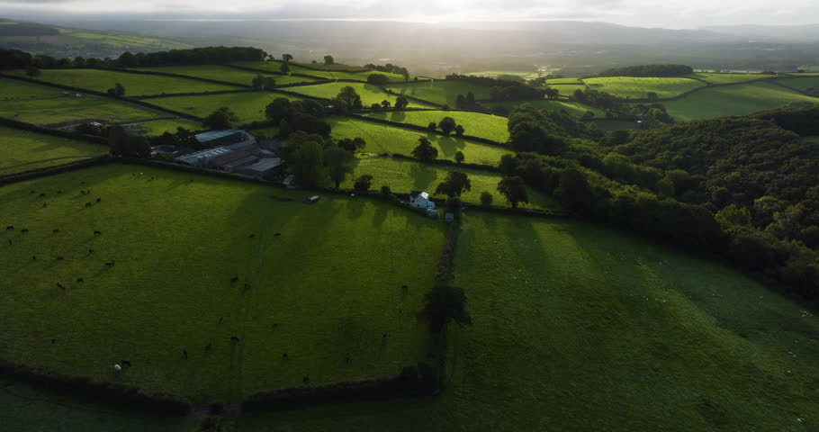 Aerial Drone Flight Over English Country Side And Farm Land.
